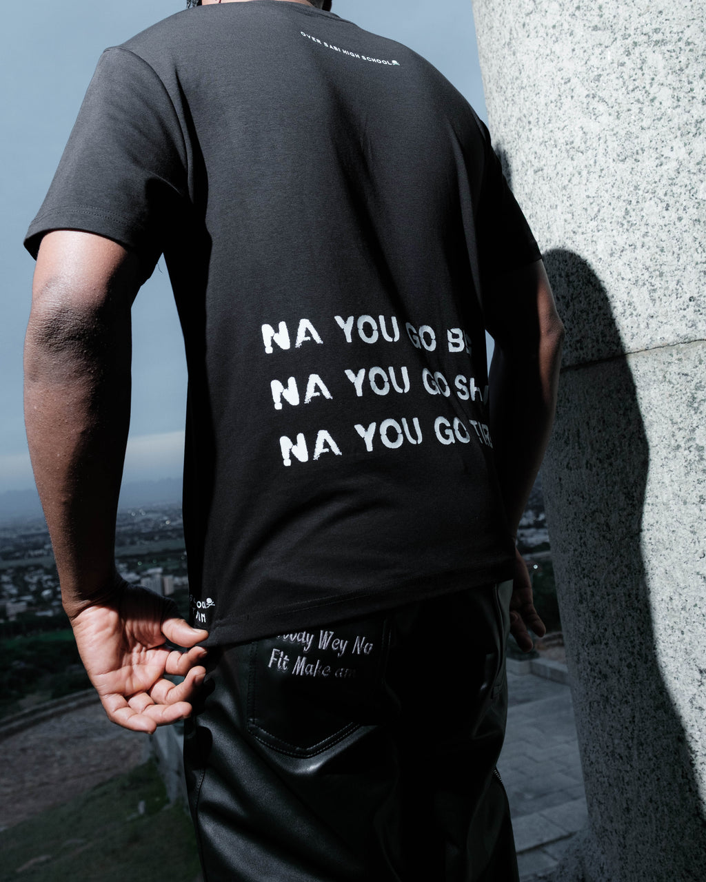 Black OVERSABI HIGH SCHOOL OSHS co-ordinated T-shirt with logo and design, made from comfortable fabric, shown on a plain background.