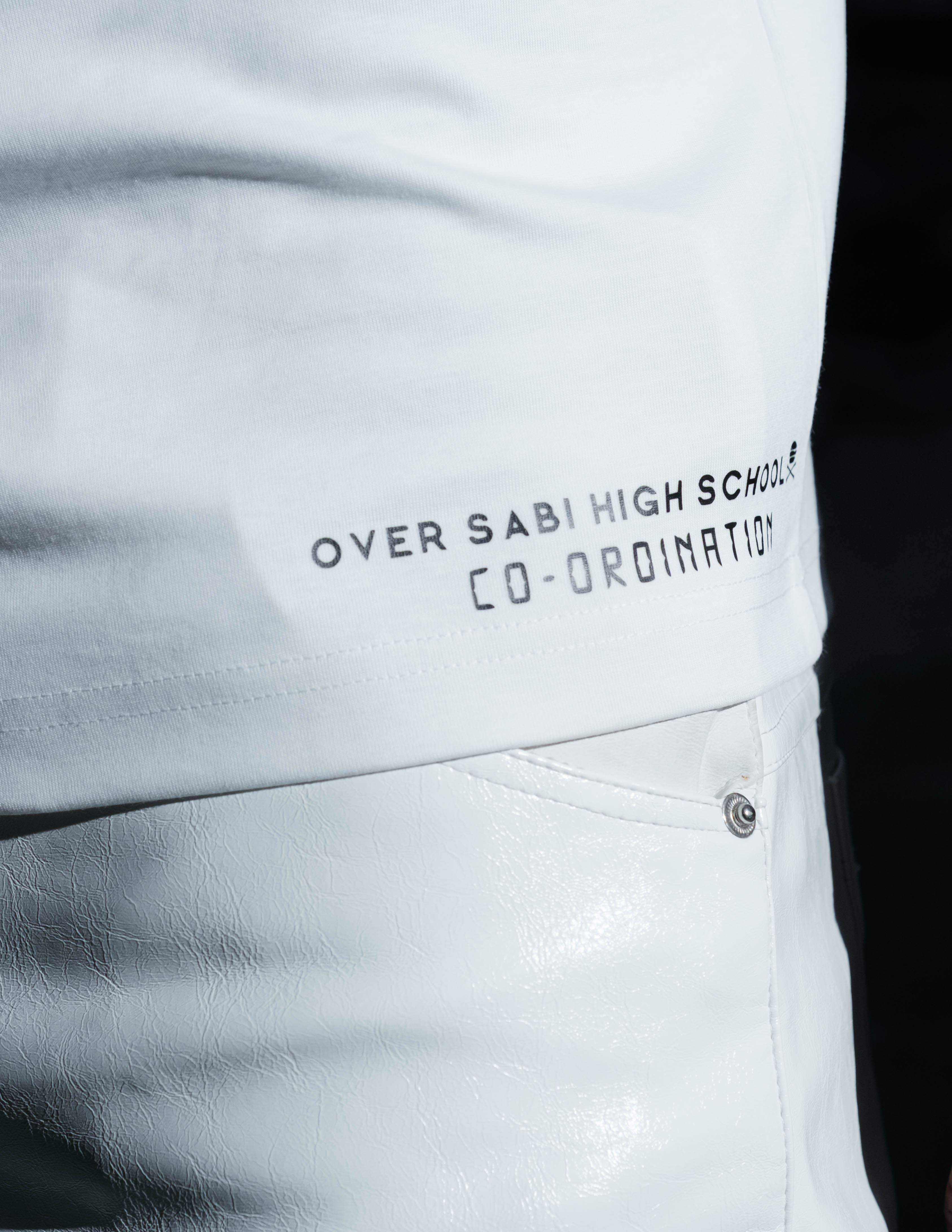 White OSHS co-ordinated T-shirt by OVERSABI HIGH SCHOOL, featuring a comfortable fit and school logo design.